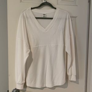 Pink Victoria Secret Velour V-neck long sleeve top. Slight curve hem, XS white